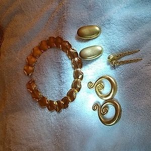 Three mattegold large earrings .one clip two post backs.one 16 inch gold color